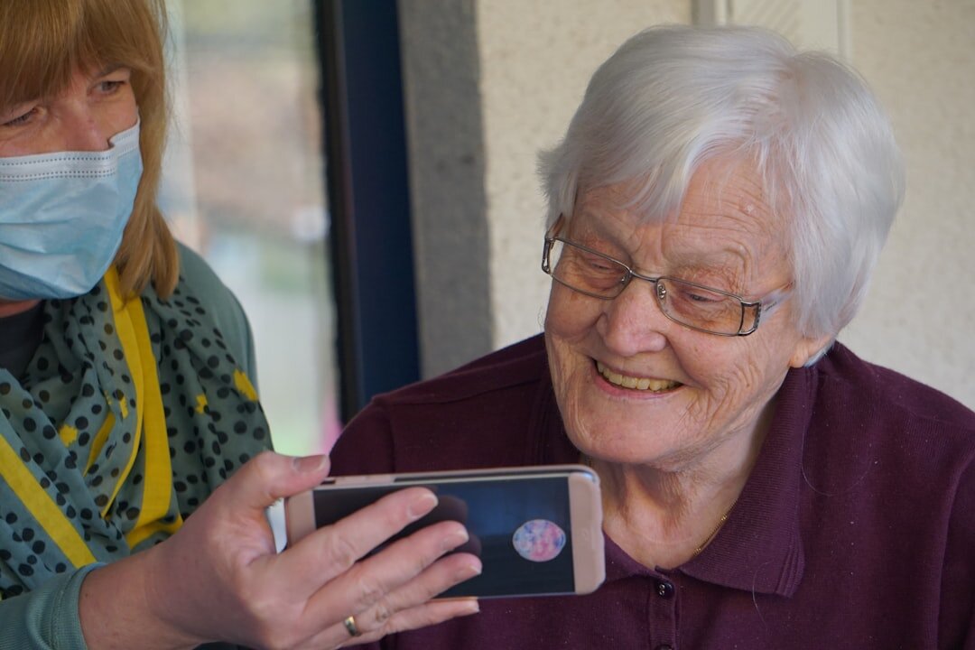nurse visiting patient at home